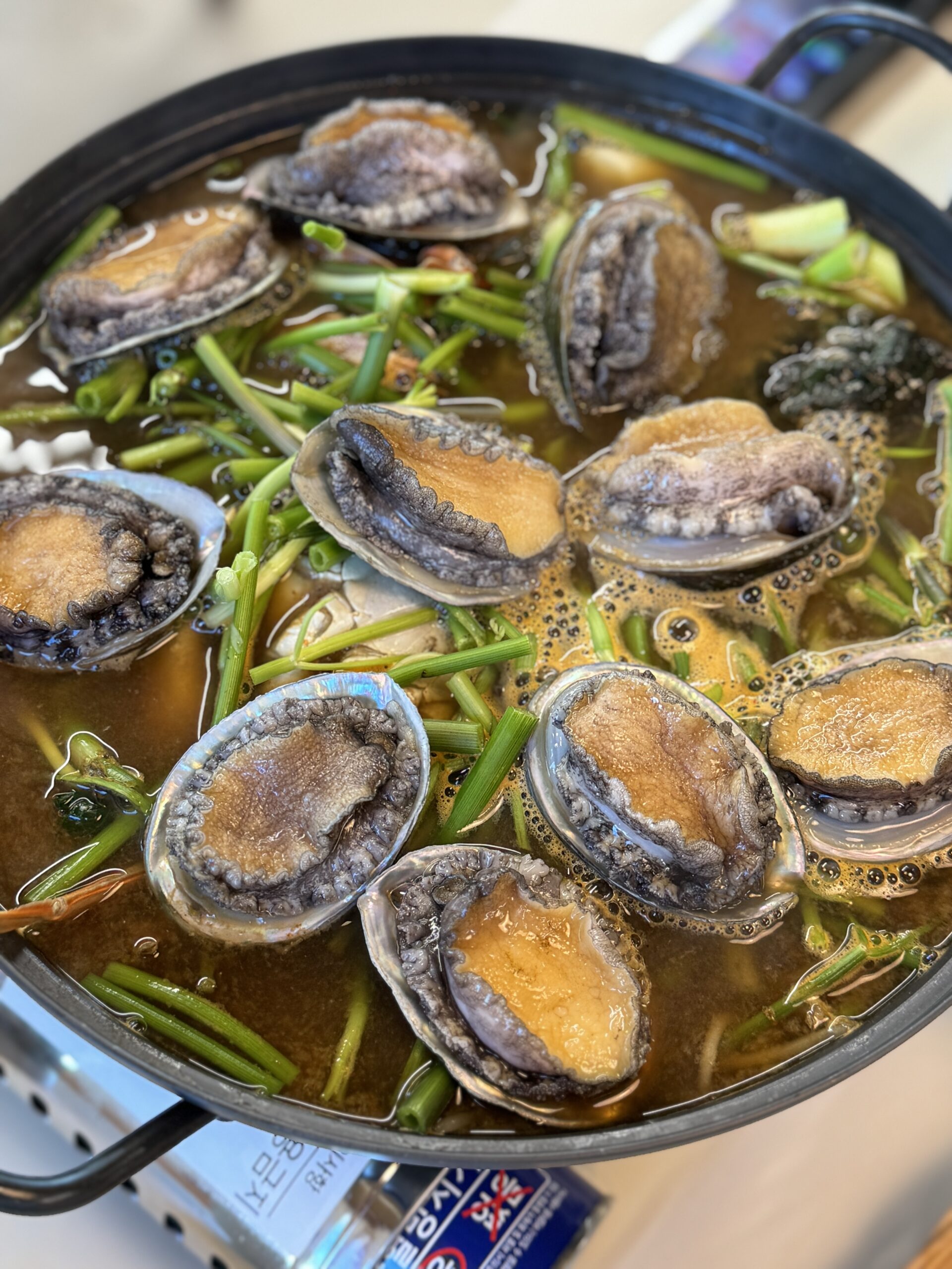 Feast on Fresh Abalone: Healthy, Delicious Meals at Jeju Choga’s Cozy Seaside Spot!